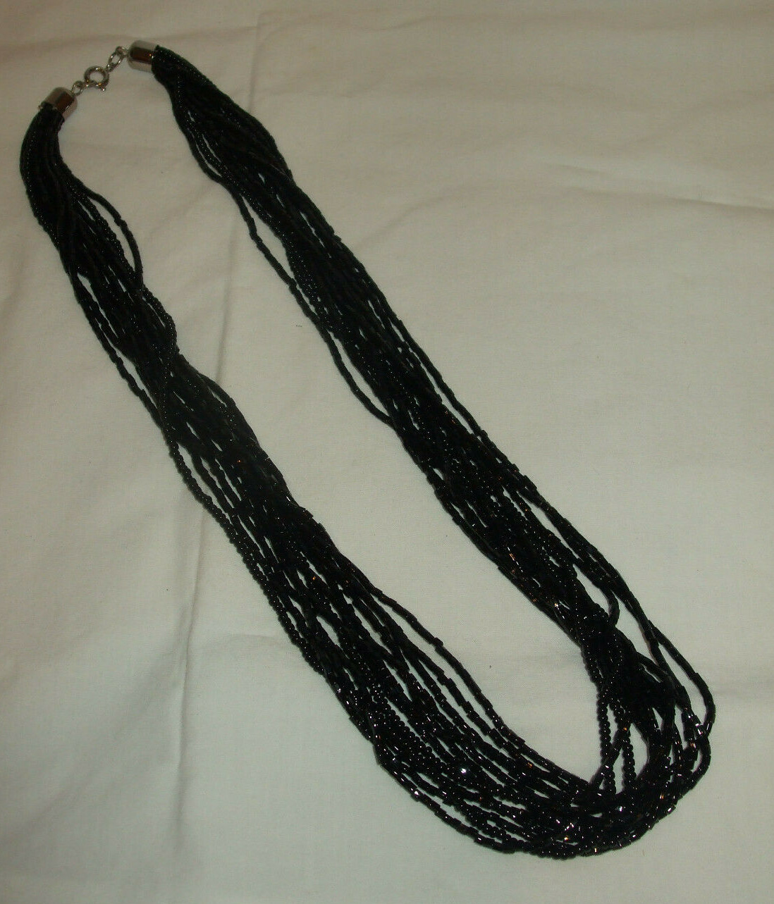 VINTAGE MULTI STRAND BLACK GLASS SEED BEAD NECKLACE 20″~NECKLACE ONLY