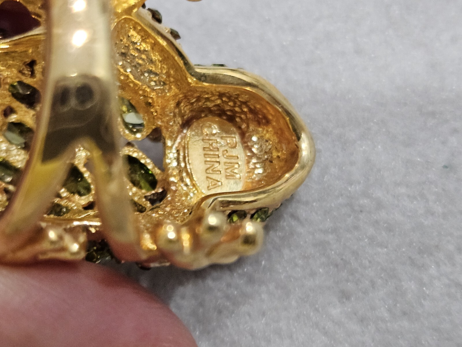 Real Collectibles By Adrienne Whimsical gold tone green crystal frog Signed PJM.