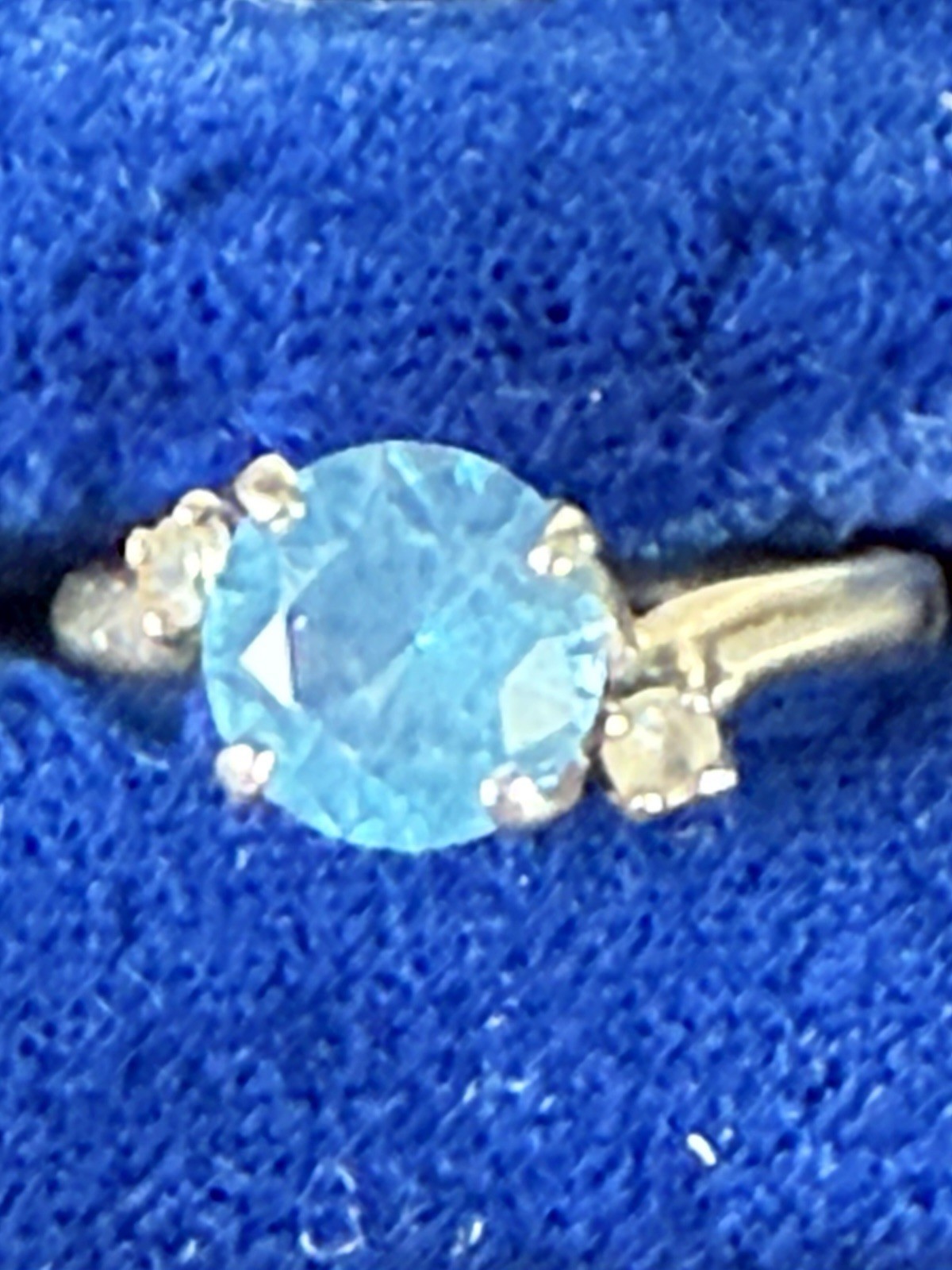 Vintage spring 10k White Gold Blue Topaz Ring.