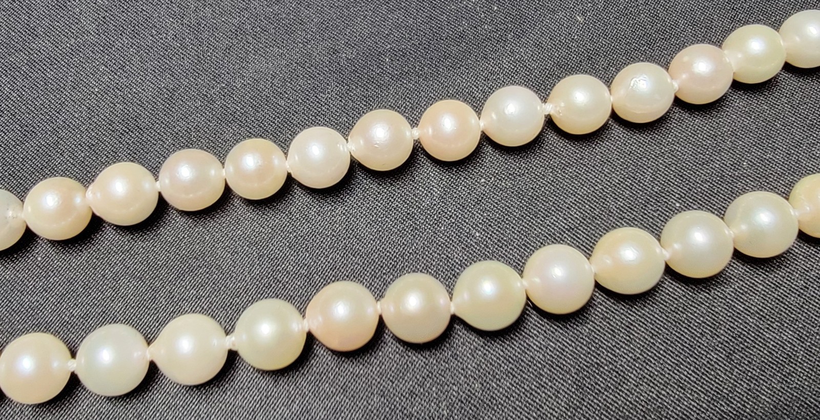 Vintage Pearl Necklace 6.9mm Pearls and 14K Gold Clasp 23.5 in Matinee Length