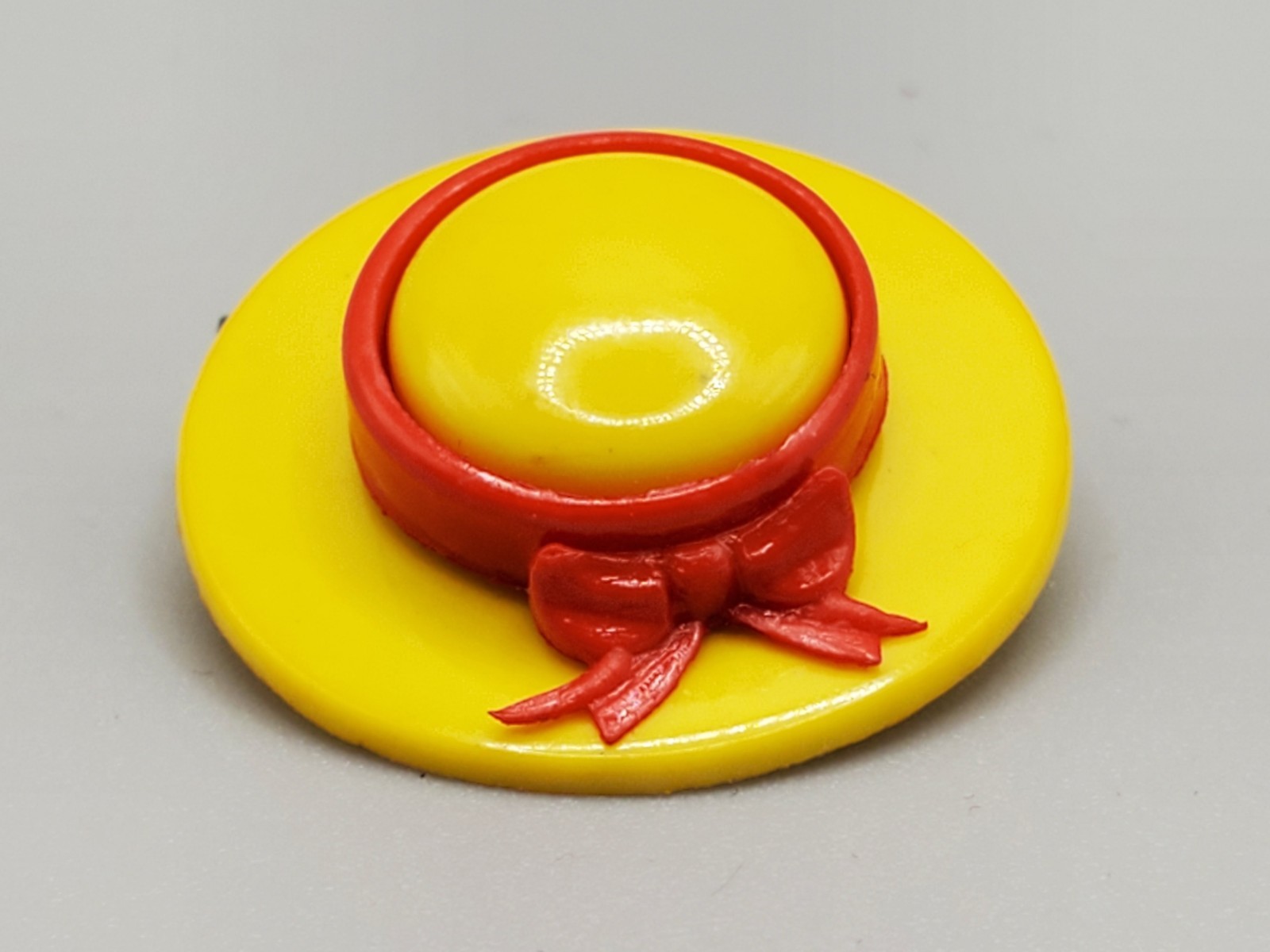 Vintage Small Yellow Hat With Red Bow Plastic Pin or Brooch