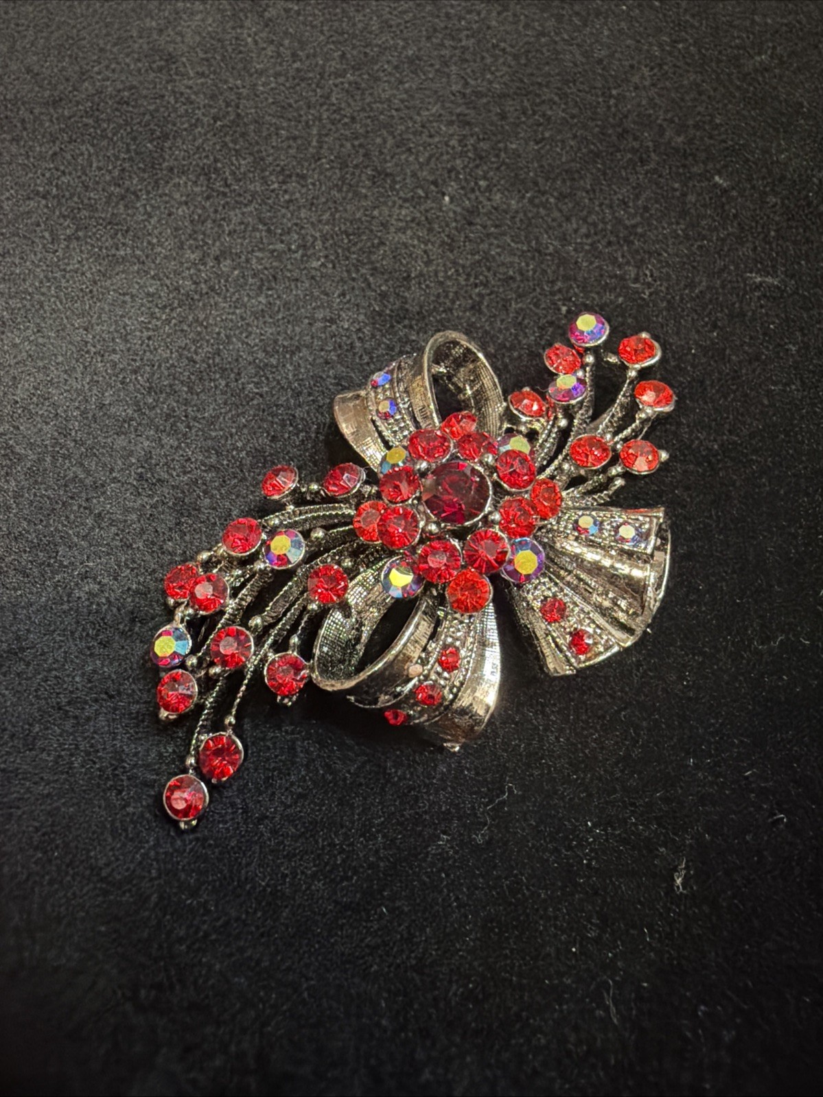 Vintage Bow Brooch Gunmetal-toned With Red Iridescent Rhinestones