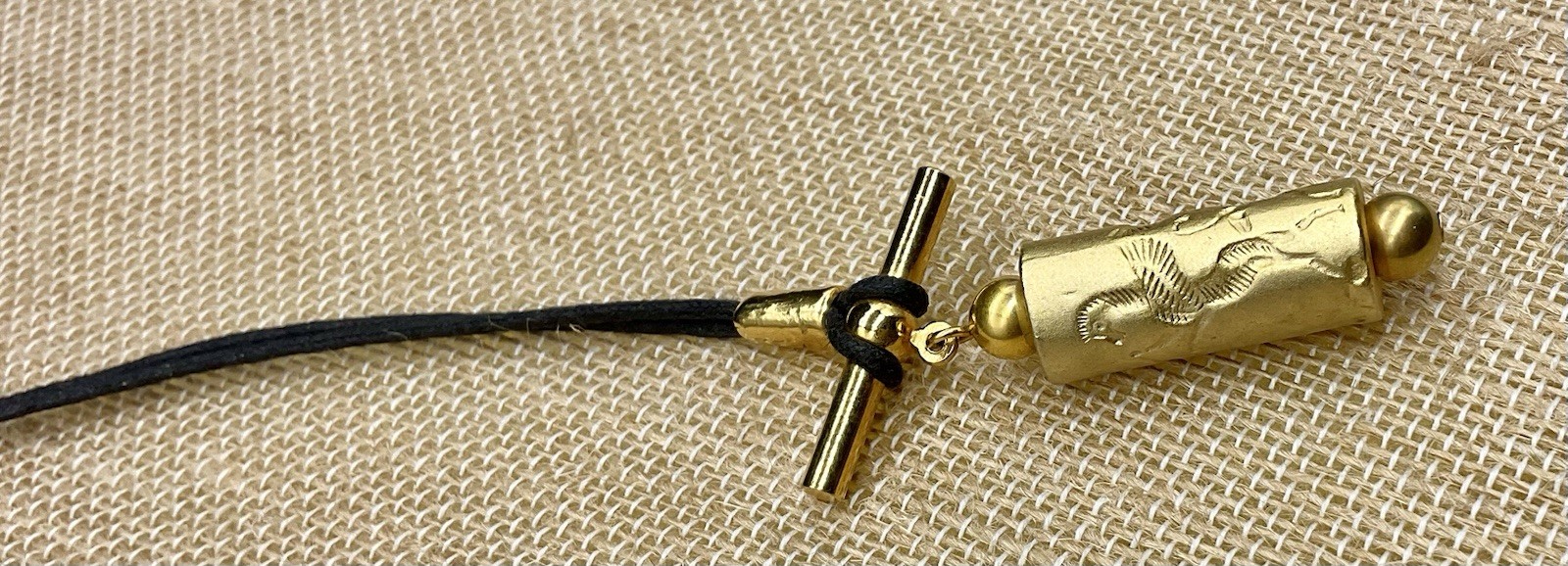 Cylinder Seal Pendant Gold Tone Unusual Design Winged Zebra & Person ?