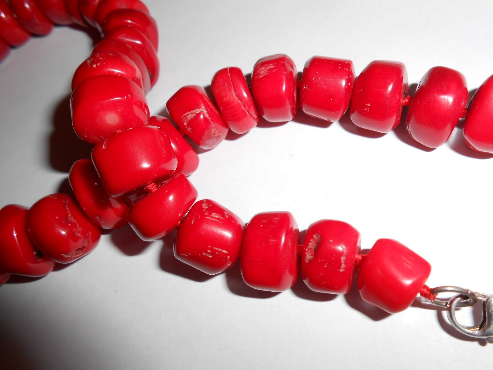 GENUINE UNDYED RED CORAL BEADS NECKLACE WITH STERLING CLASP.