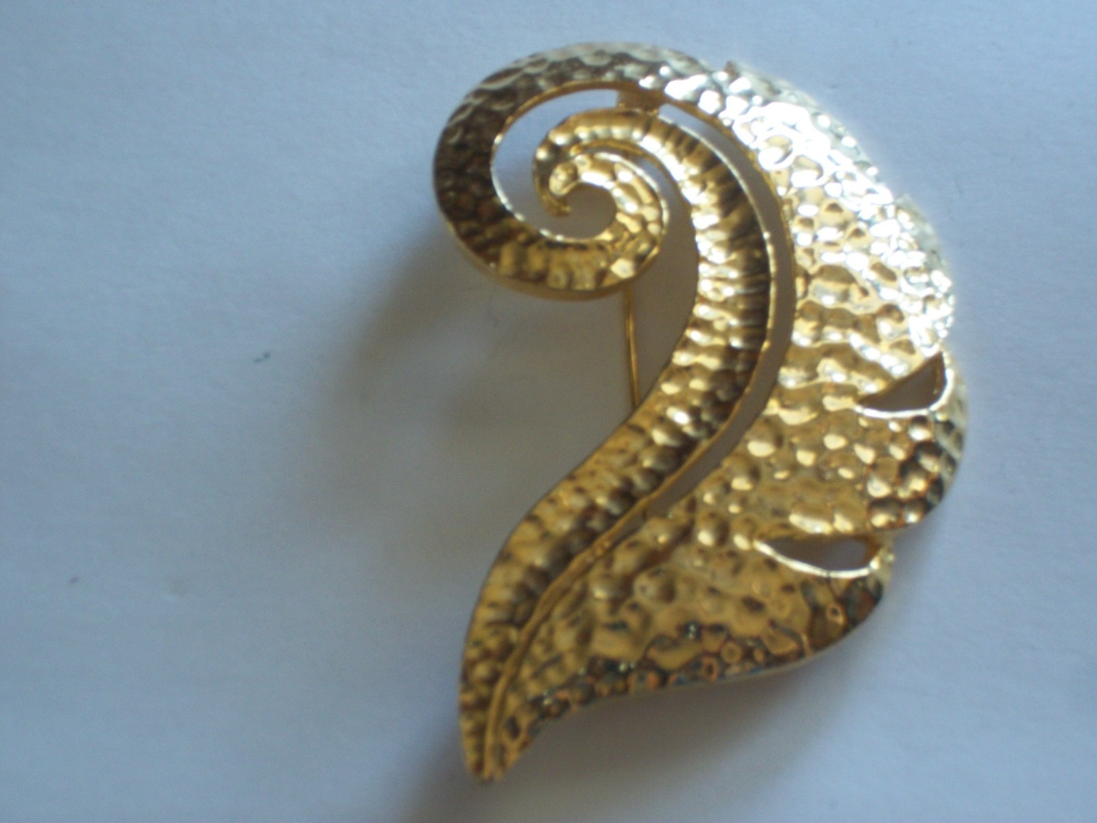 Hammered gold plated curled leaf