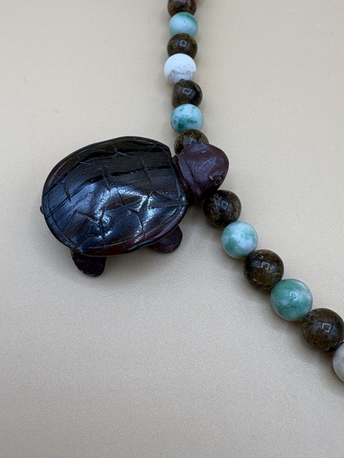 Assorted Color Stone Bead Necklace with 5 Carved Turtle Pendants