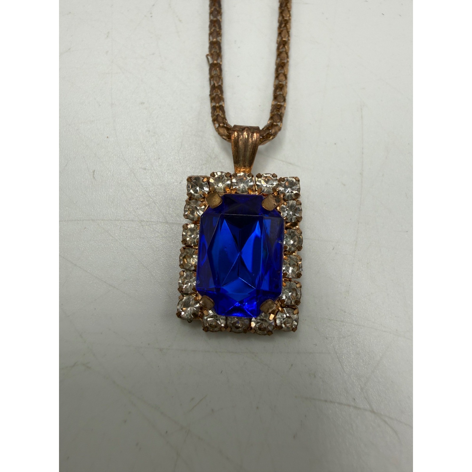 Vintage Blue Faux Sapphire Rhinestone Halo Pendant Gold Tone Popcorn Chain 22″