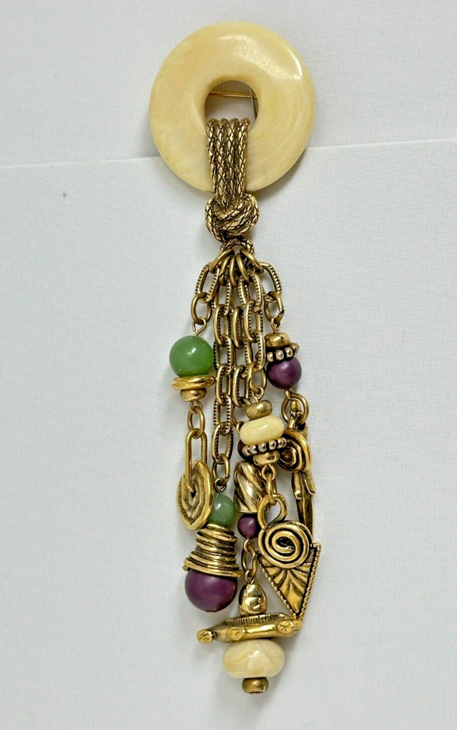 1928 Brand Goldtone Purple Cream Green Bead 5.75″ Long Fringe Brooch Pin