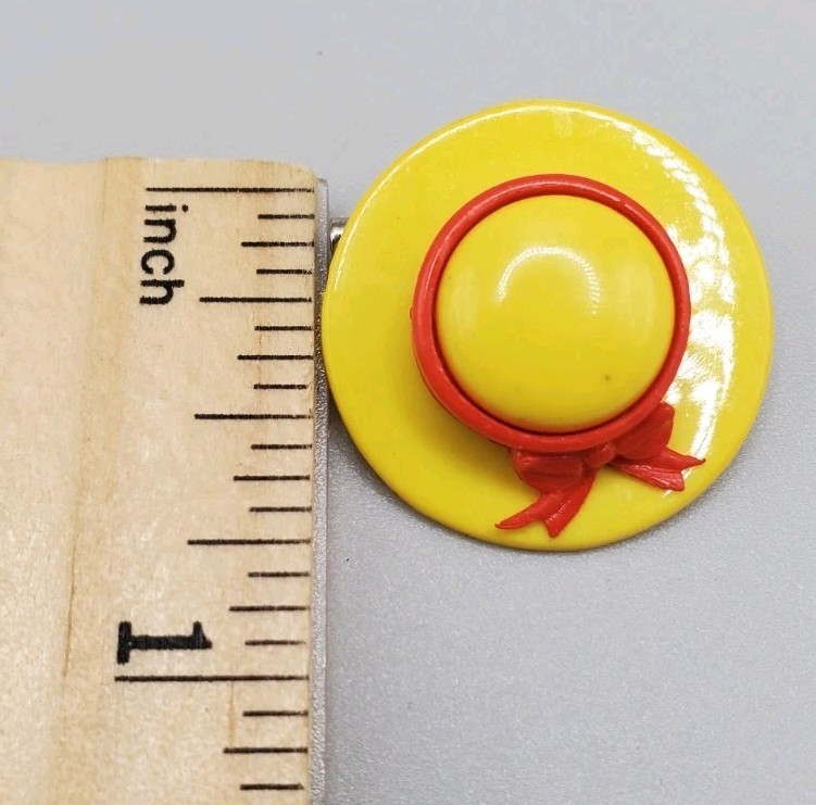 Vintage Small Yellow Hat With Red Bow Plastic Pin or Brooch