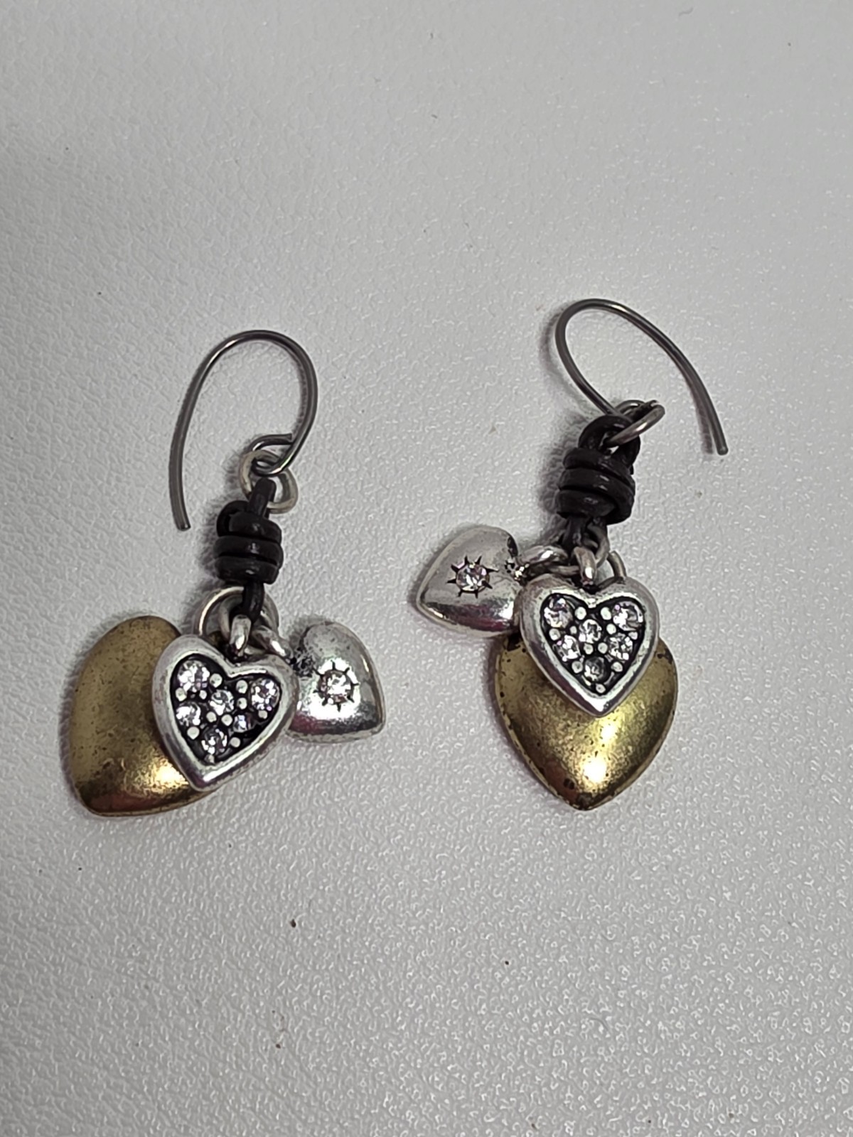 Vintage “Fossil” Two Tone Heart Dangle Pierced Earrings, about 1 inch dangle
