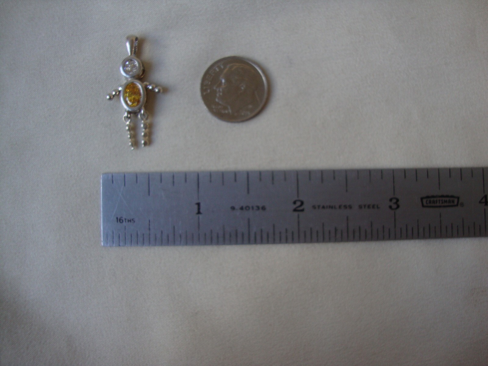 VINTAGE 1980s JIGGLY LEGS BOY OVAL YELLOW CZ BIRTHSTONE SILVER 925 CHARM/PENDANT