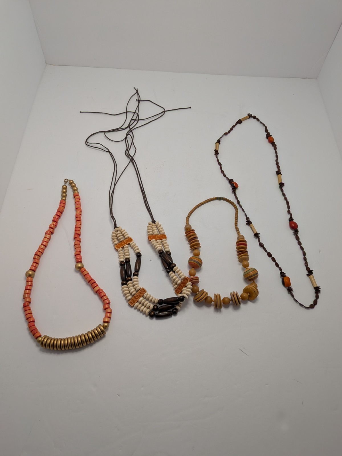 4 Vintage Wooden Beaded Necklaces Various Lengths, Brown, Peach, & Gold Colors