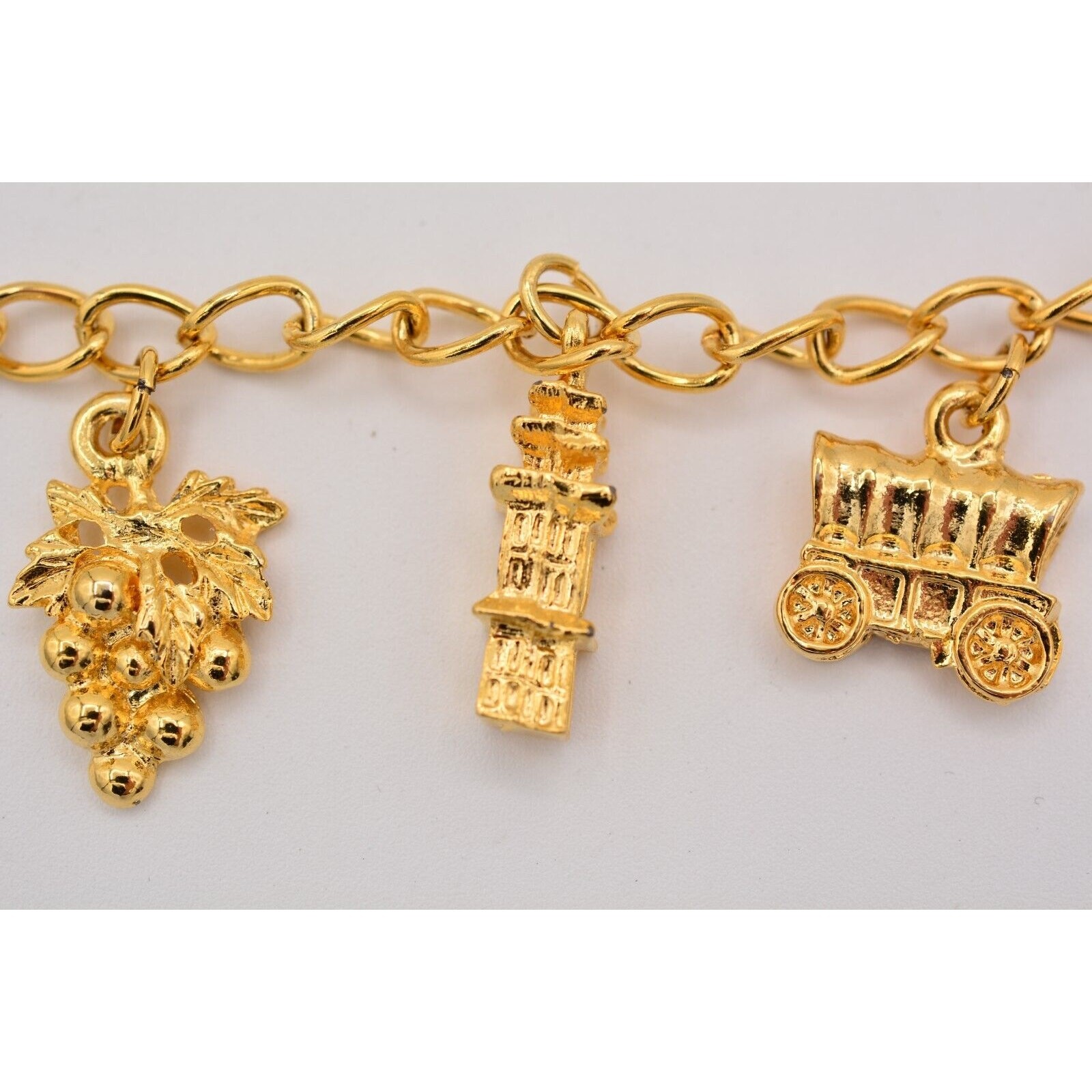 Vintage Charm Bracelet Disneyland Grapes Sailboat Gold Tone Chain Dangle BinAD