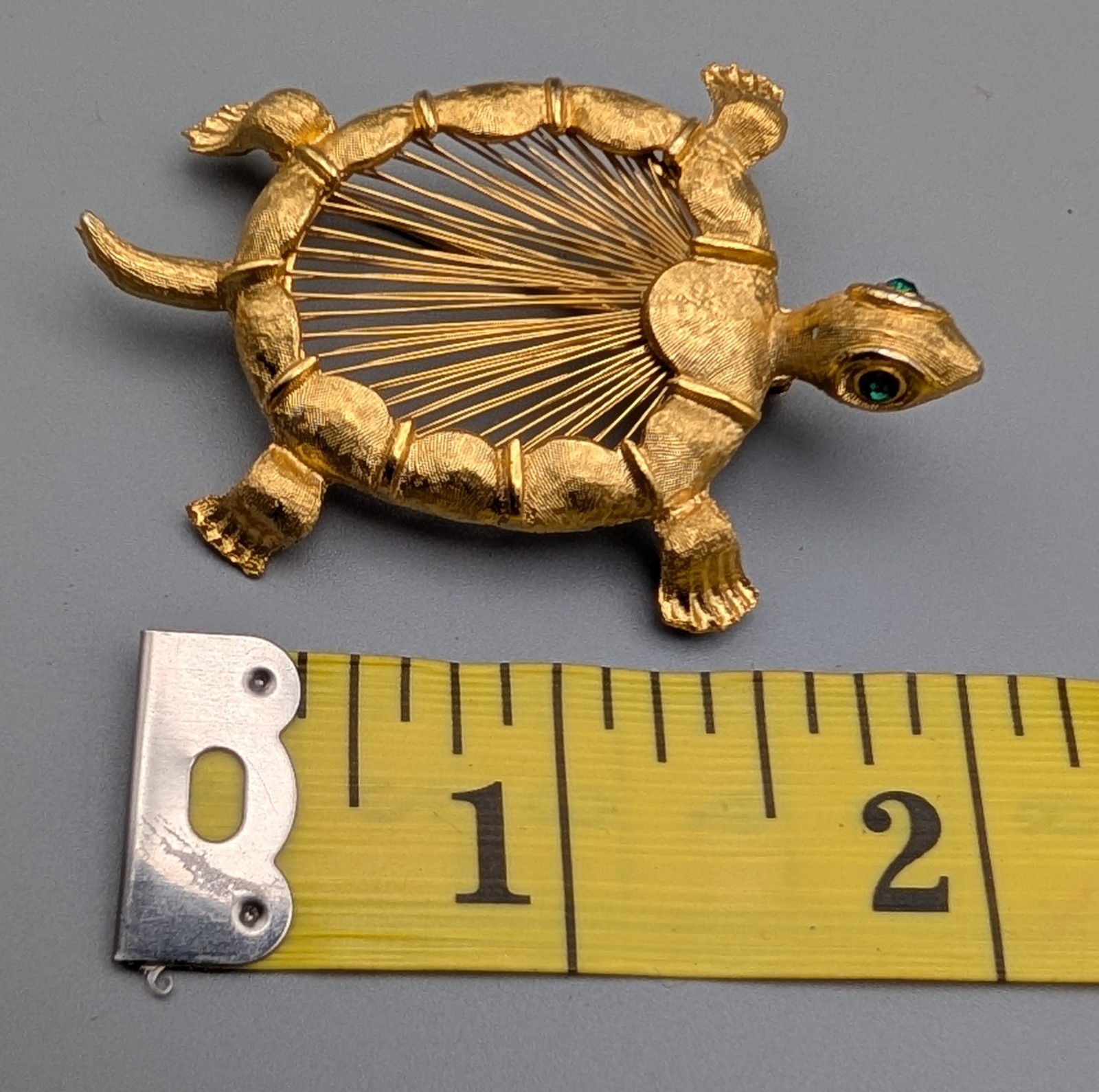 Vintage Monet Turtle Brooch Gold Tone Openwork Shell Green Rhinestone Eyes