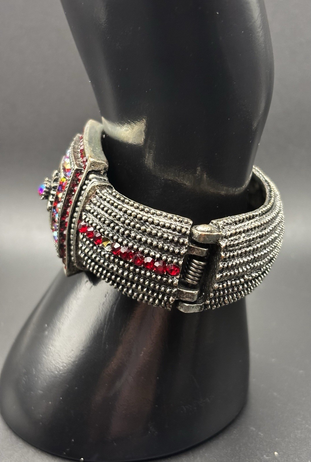 Ruby red and iridescent Aurora Borealis rhinestones Hinged Bracelet
