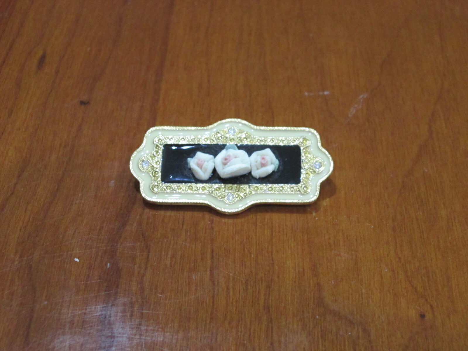 Vintage Gold & Black Tone Brooch w/Raised Flowers & Stones Approximately 2″
