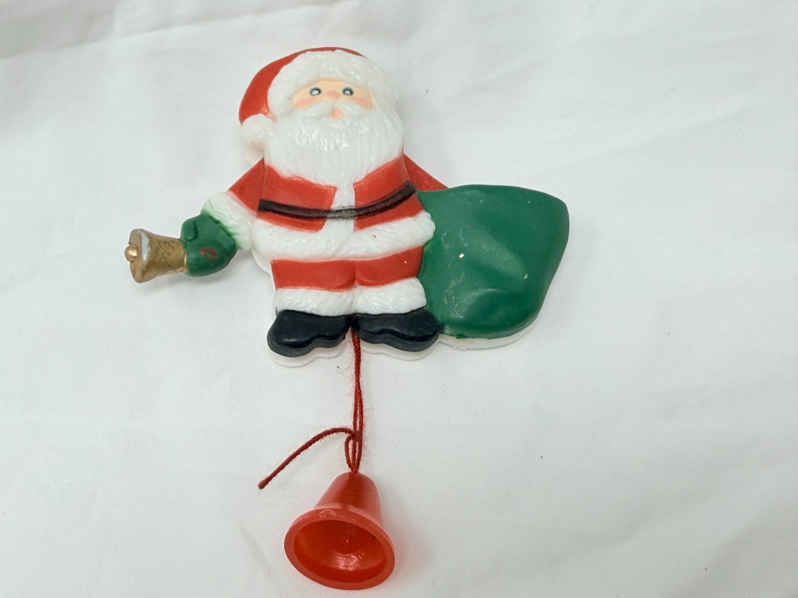 Vintage Fun World Santa Claus Moving Arms Sack of Toys Christmas Plastic Pin