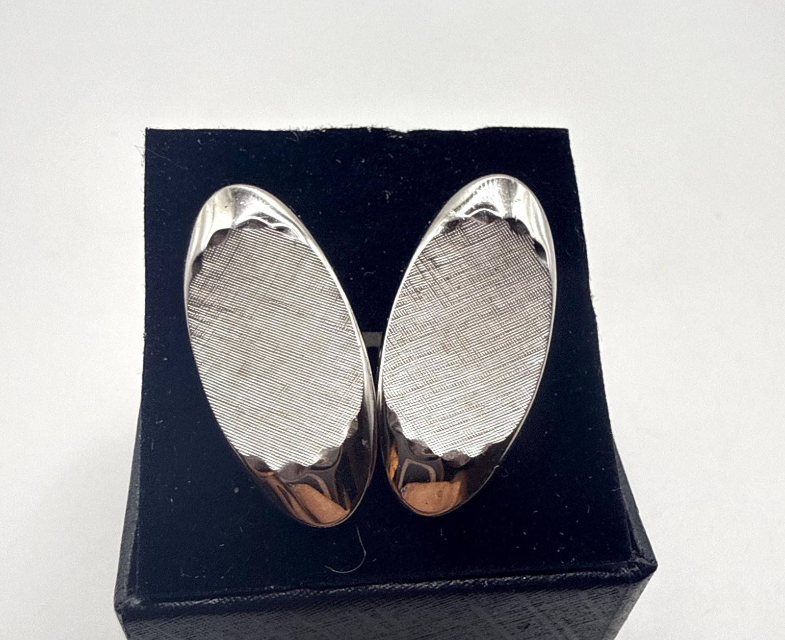 Vintage Swank silver tone textured elongated oval cuff links and tie clip set