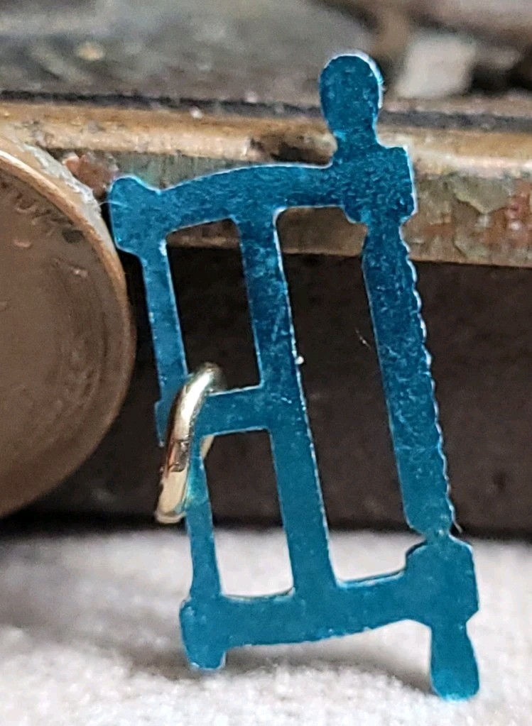 Vintage Blue Metal SAW charm prize jewelry