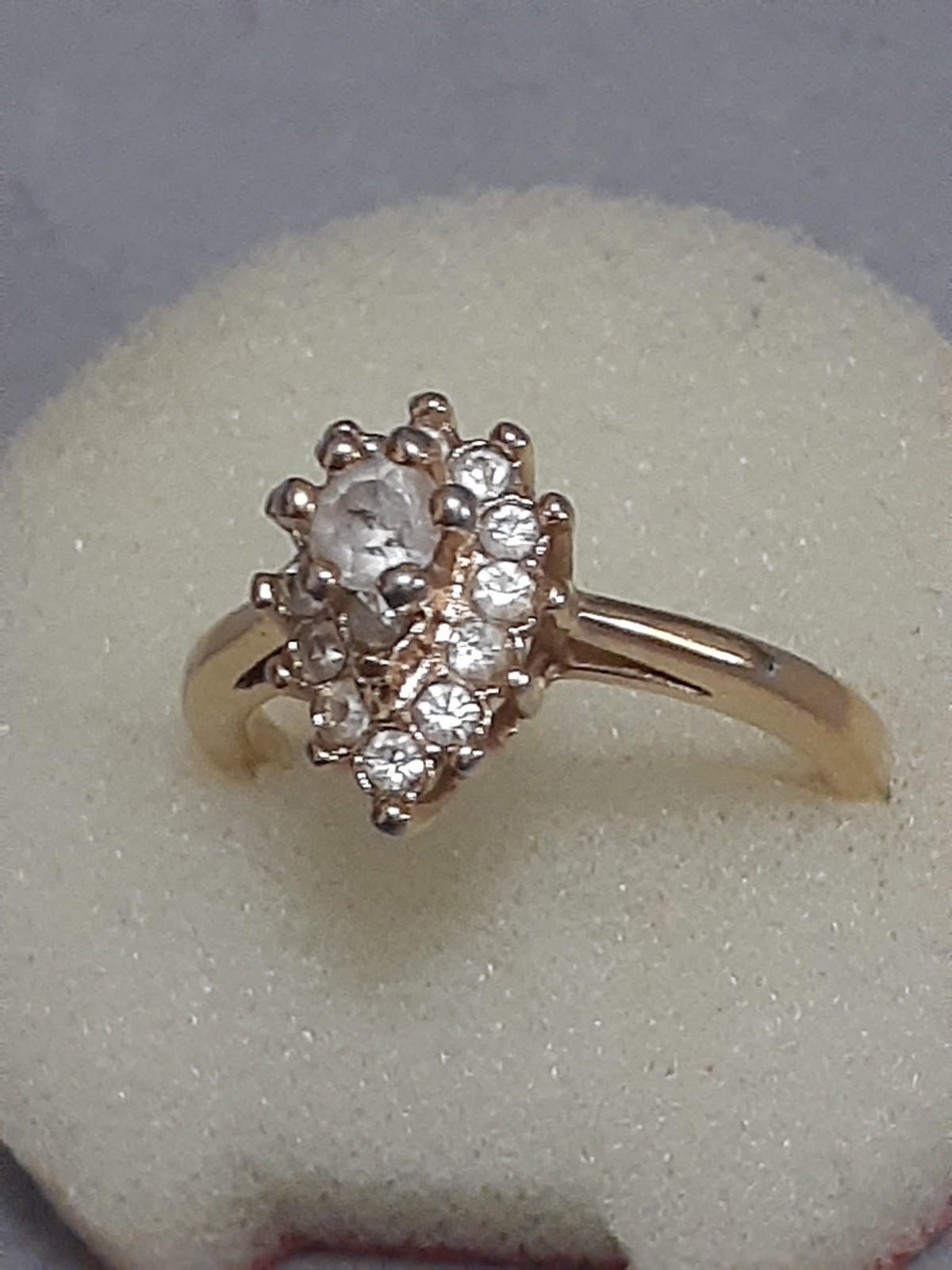 18K HGE prong set clear stone cluster ring, rosette, teardrop shape. Size 6