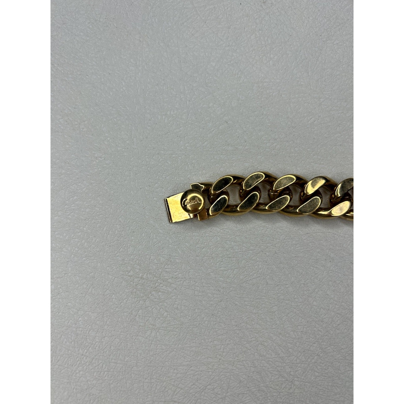 Coach Gold-Tone Curb Chain Bracelet with Fuchsia and Red Rhinestones