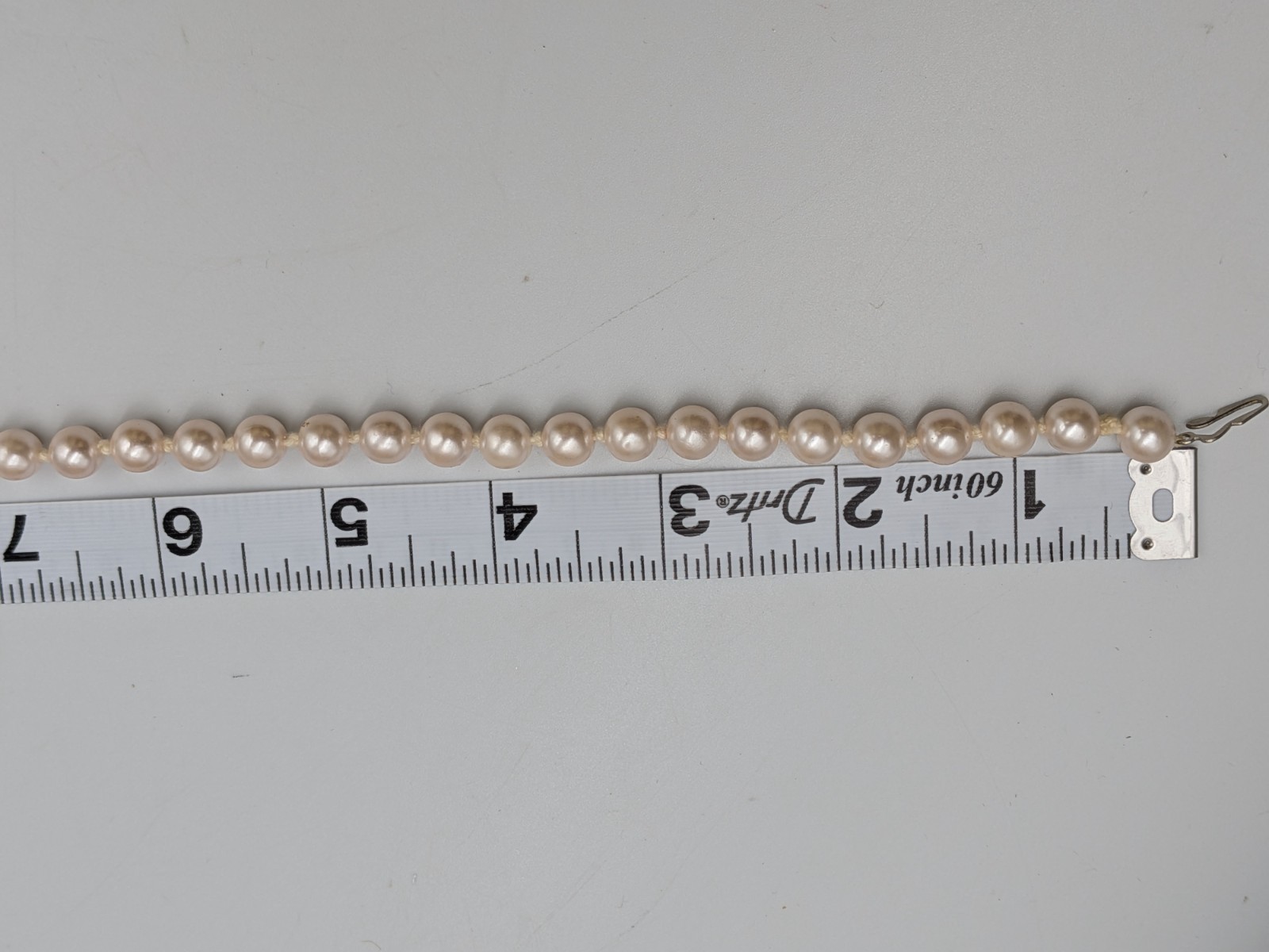 Vintage Faux Pearl Necklace Knotted with silver tone fish- hook clasp unbranded