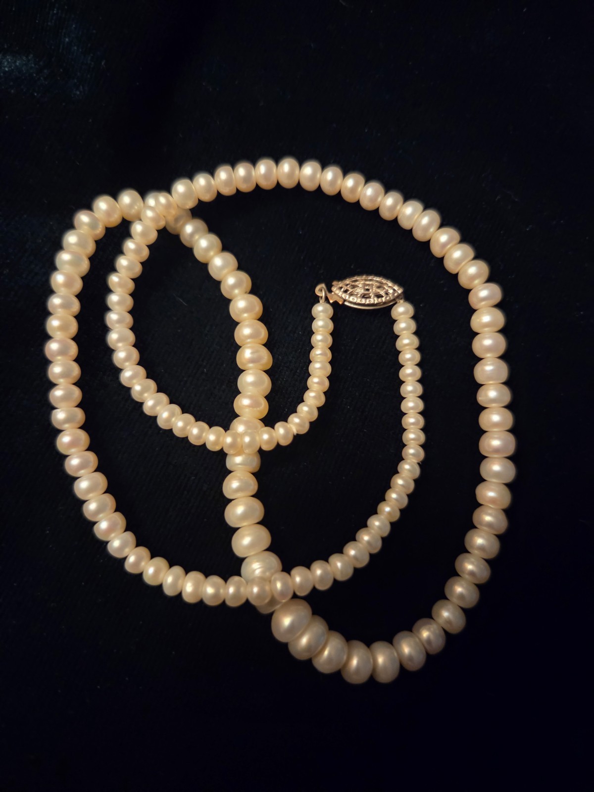 Vintage graduated natural pearl necklace with fish hook clasp