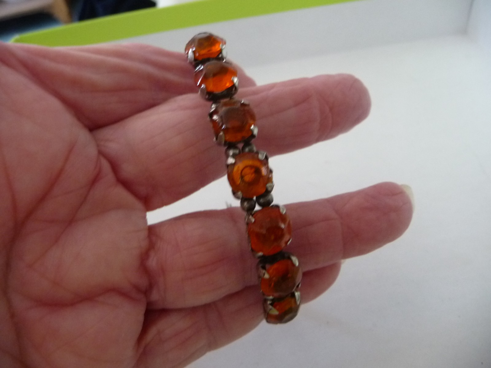SILVER TONE WRAP AROUND W ORANGE STONE 1/4” W BRACELET #20/12