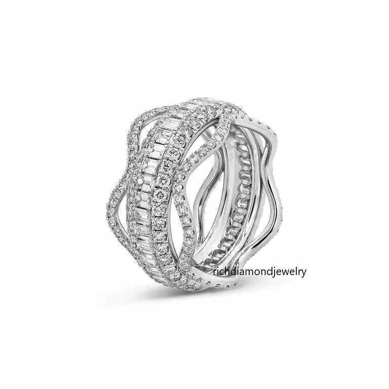 Unique and Gorgeous Piece Showcasing a Row Of Emerald Cut & Round Cut CZ Band