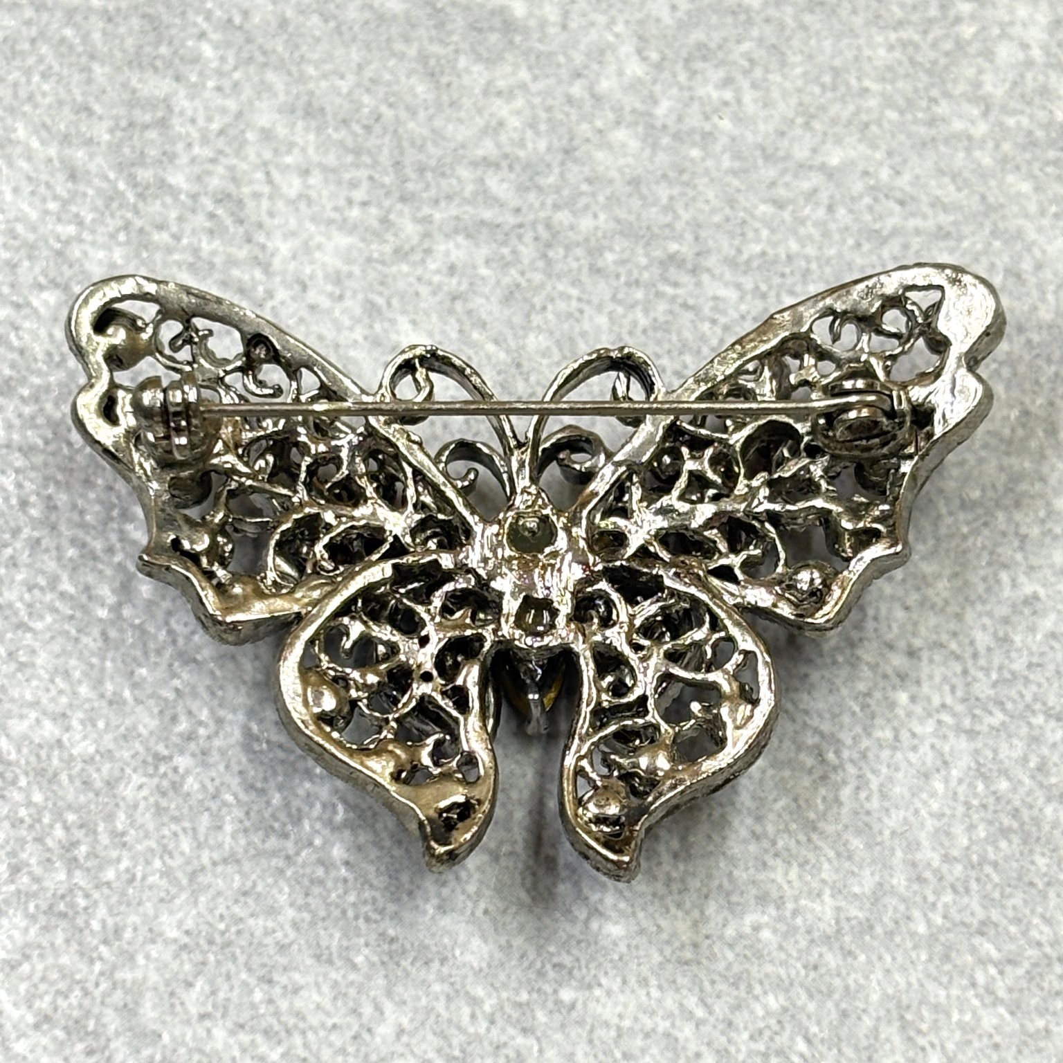 Vintage Butterfly Filigree Silver Tone Brooch 2″ x 1.5″ Rhinestone Multi-Color