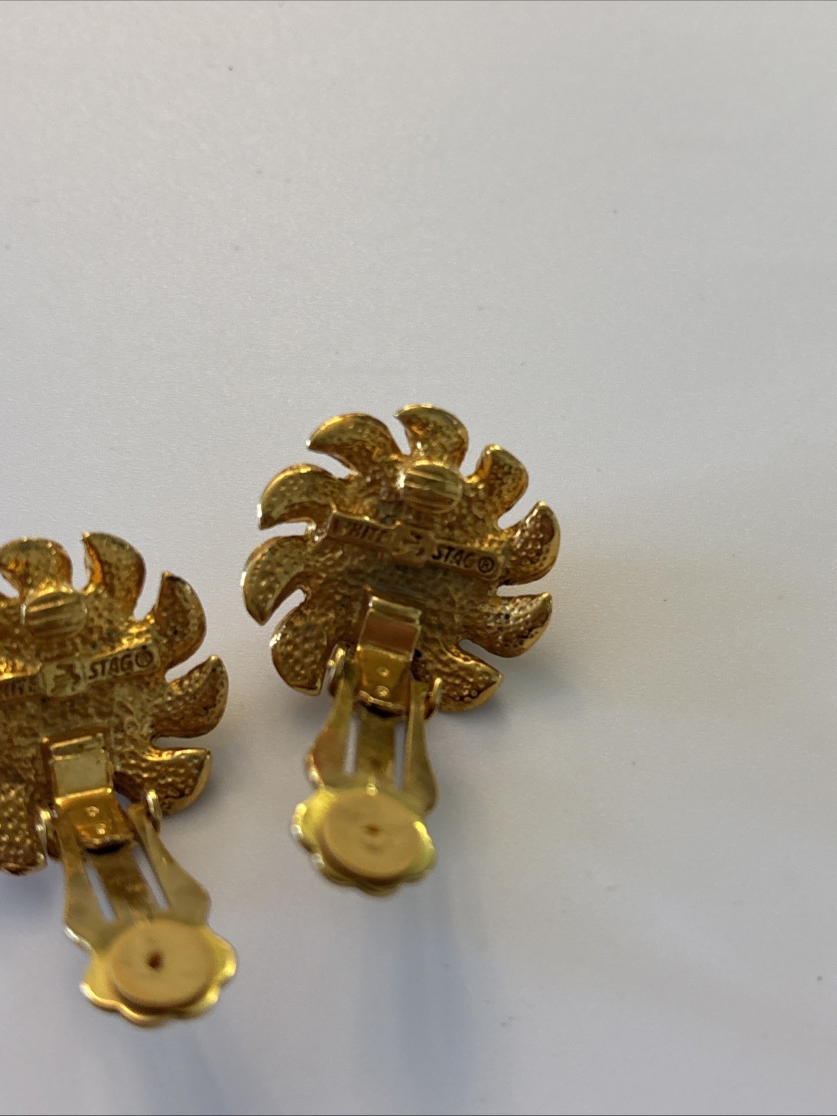 White Stag Clip on Earrings Golden Tone Metal Black Stone Center