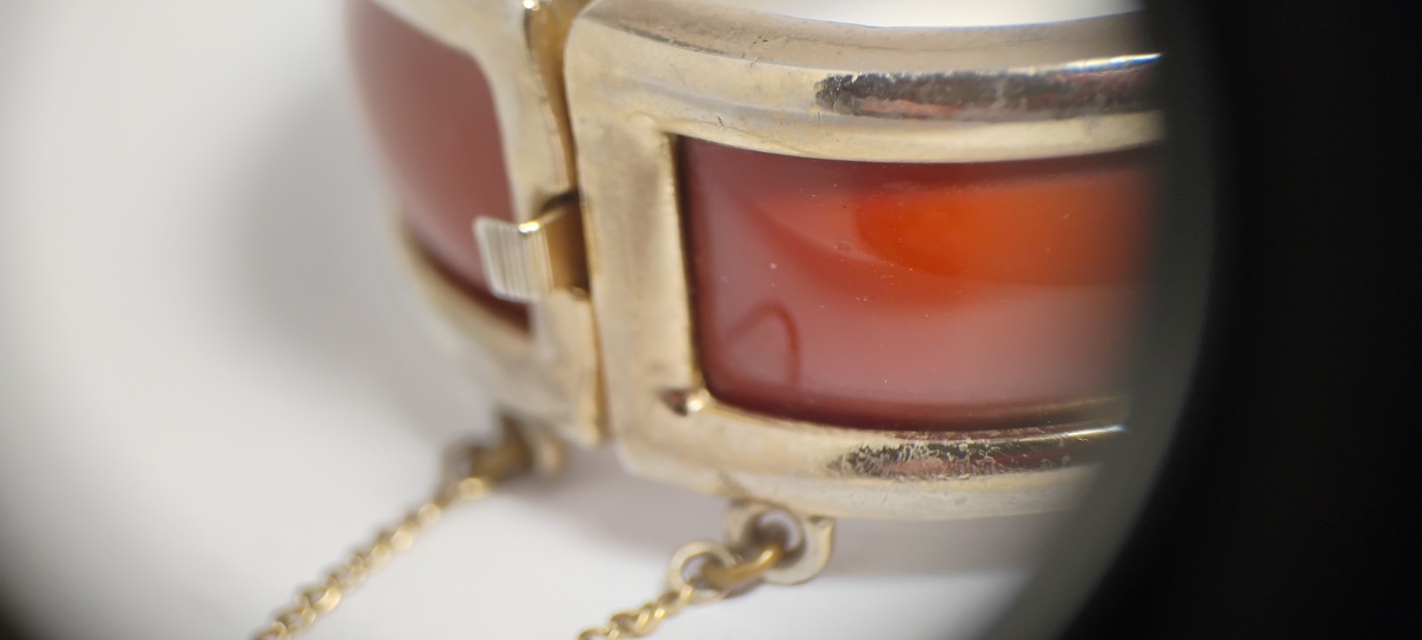bergere goldtone hinge cuff bracelet inlaid w/soft redish brown material-nd6