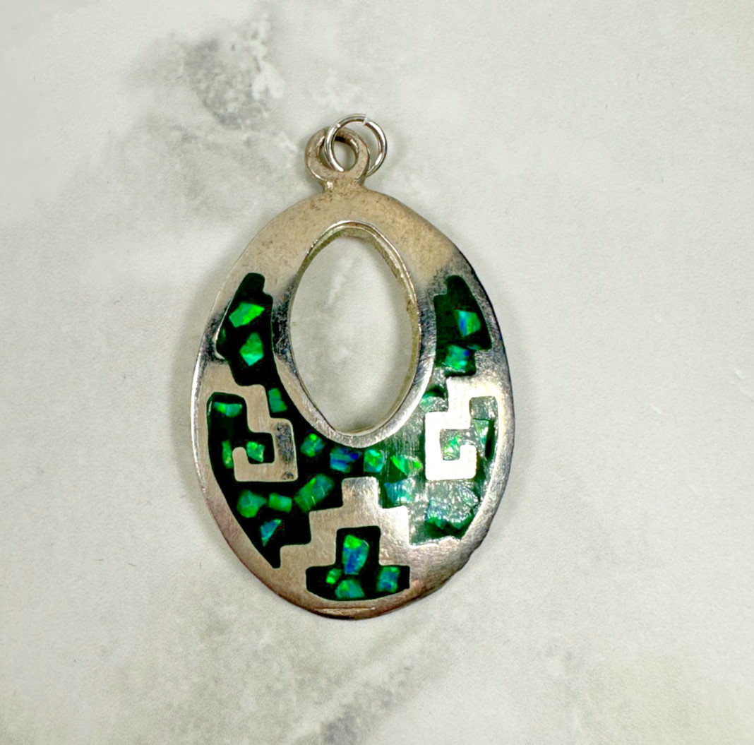 Sterling Silver Green Opal Chip Inlay Oval Cut Out Pendant – 1 1/2″ Long