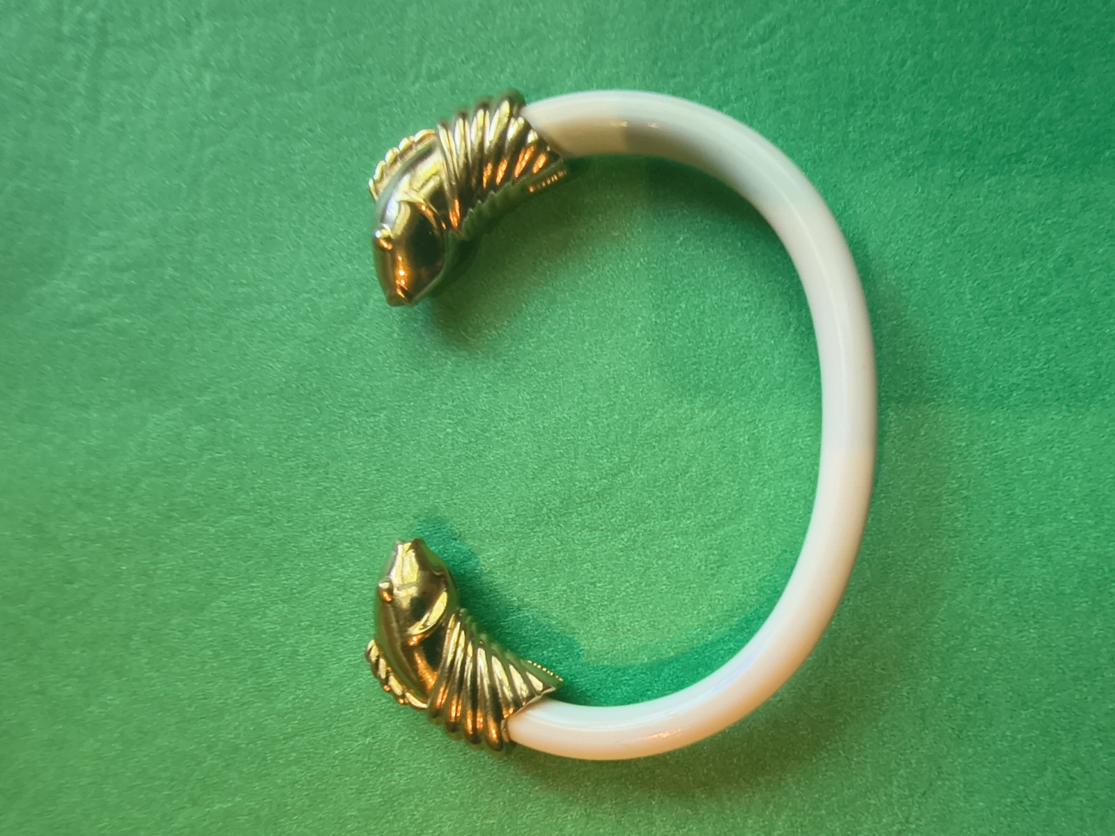Signed Monet vintage bracelet with a bright gold-tone finish.
