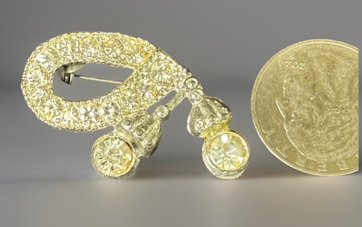 Vintage/Antique Brooch With Ribbon Design Lined With Clear Rhinestone Crystals