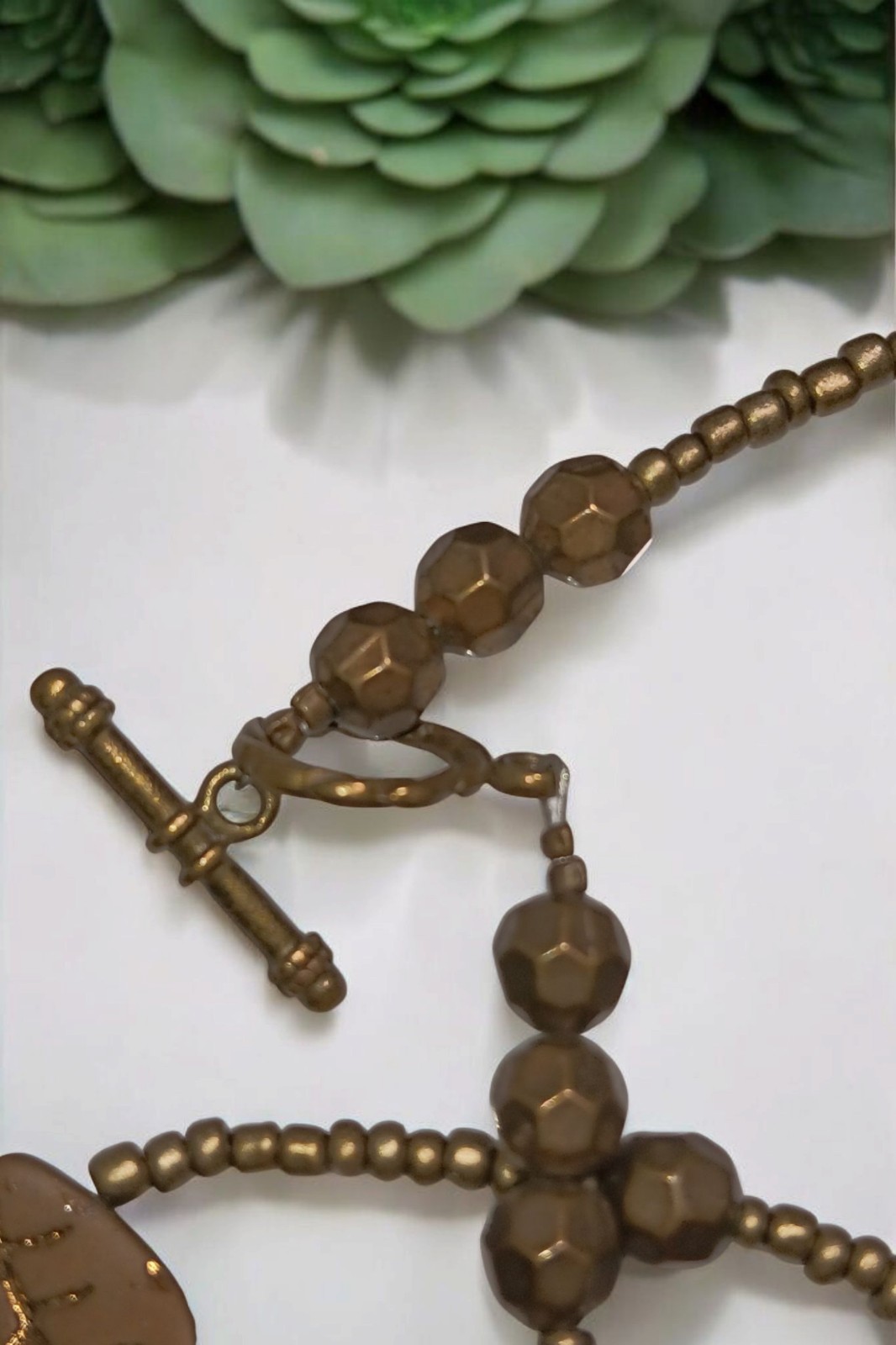 Brass Toggle Closure Necklace With Leaves On It