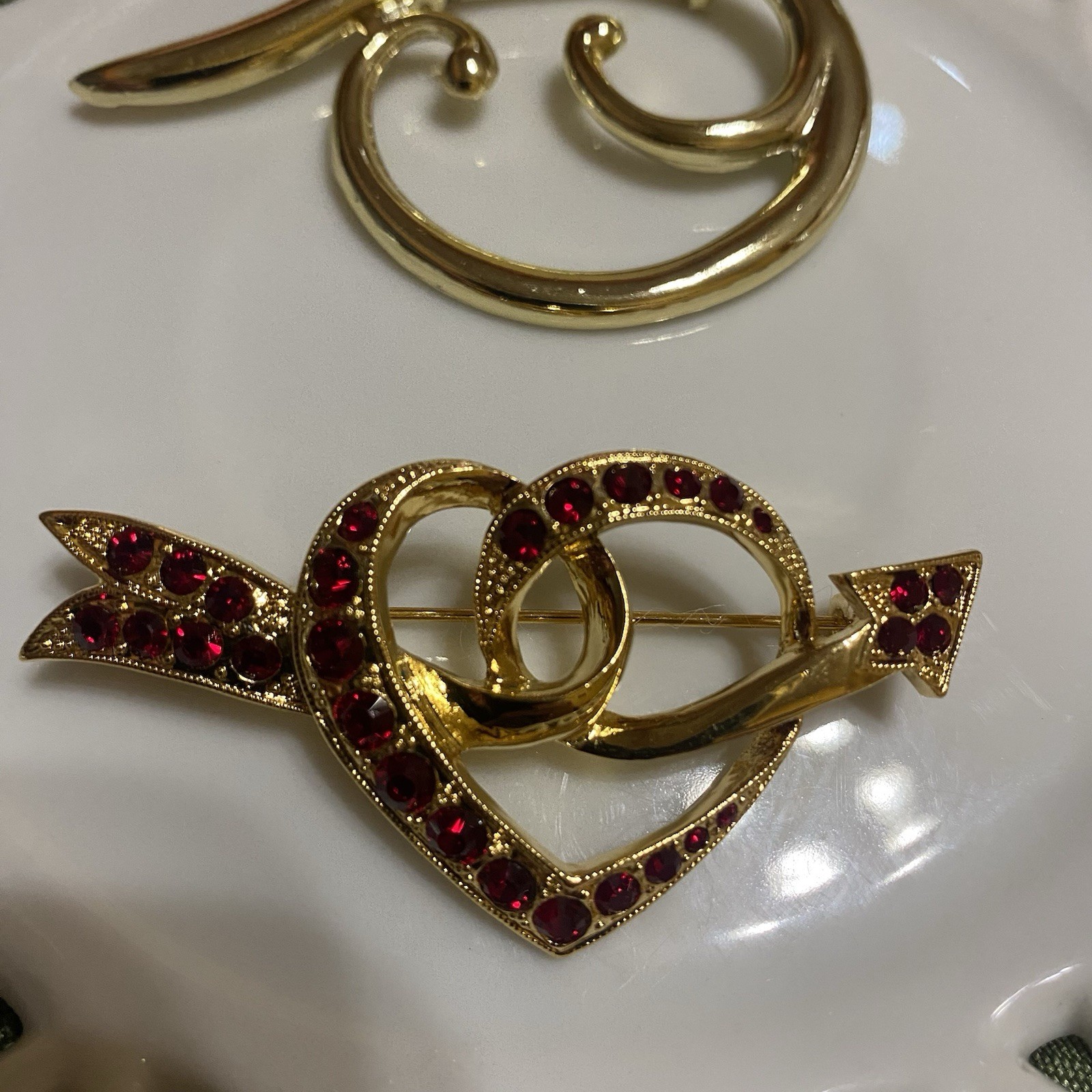 Goldtone Q Wave Brooch & Heart And Arrow Red Rhinestone Goldtone Brooch