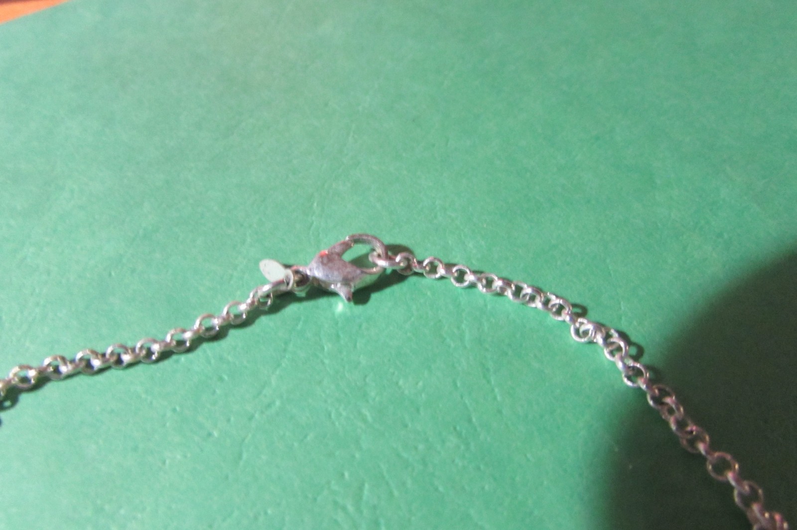 LMN 17″ necklace and almost 2″ pierced earring set silvertone swirl w/rhinestone