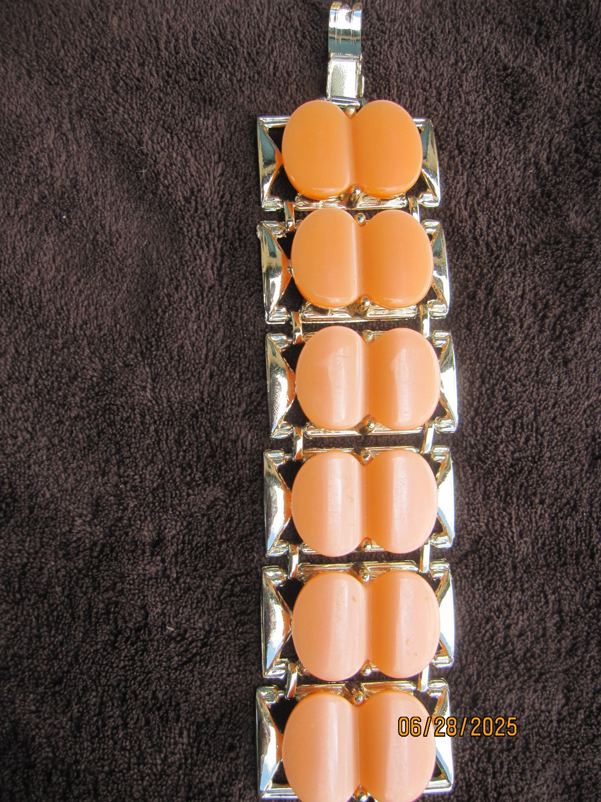 Vintage Bracelet unknown metal with orange faux stone Marked DAM