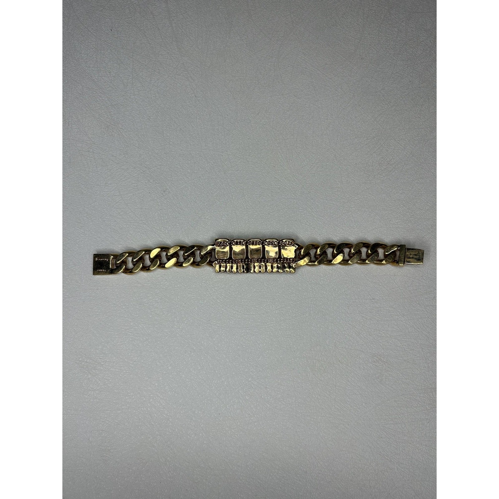 Coach Gold-Tone Curb Chain Bracelet with Fuchsia and Red Rhinestones