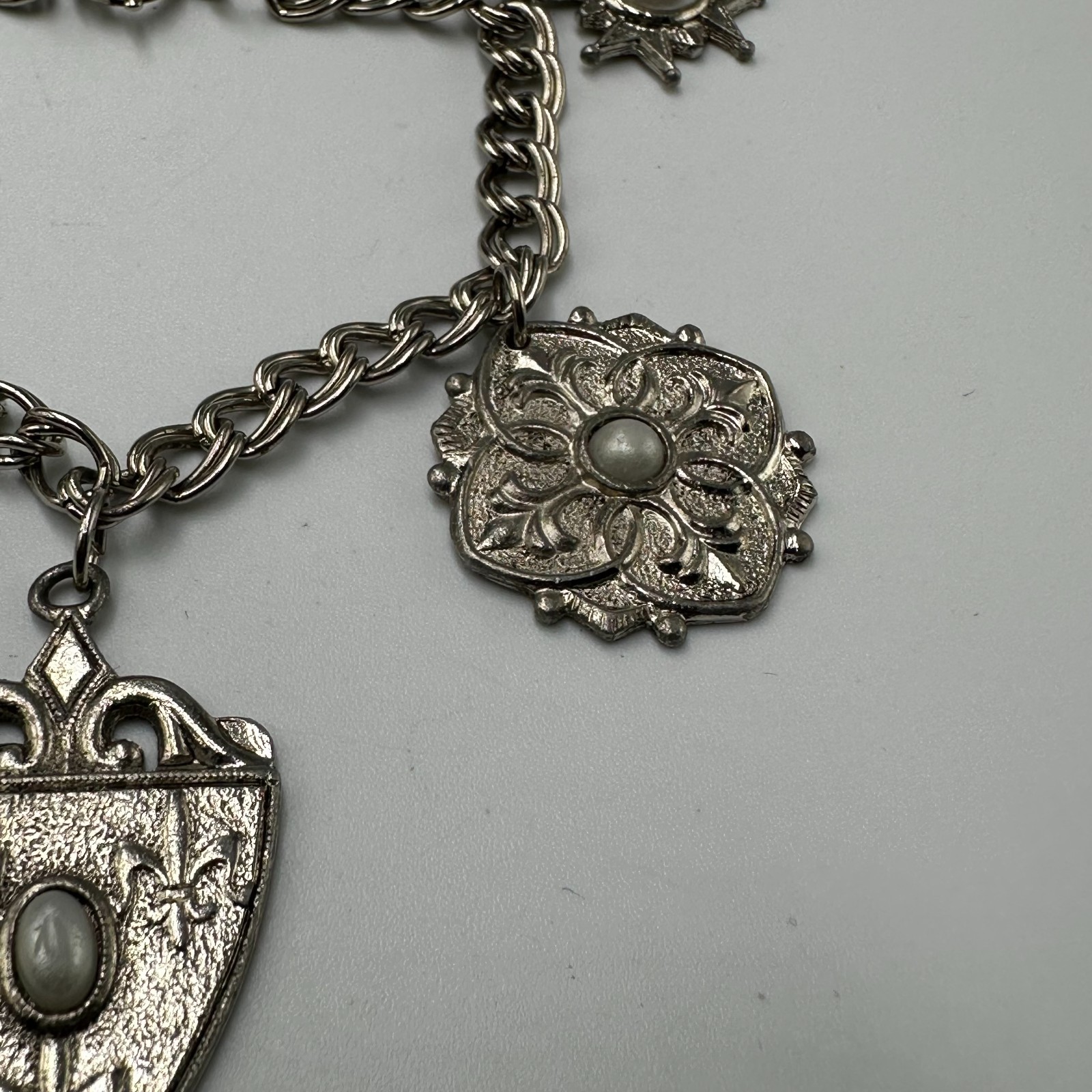 Vintage Charm Bracelet Silver Tone Filigree Embossed Faux Pearl Dangle Shields