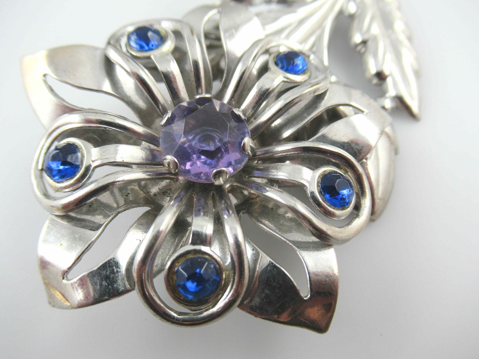 Vintage Purple/Blue Rhinestone on Silver Tone Stamped Metal Flower Brooch, Pin