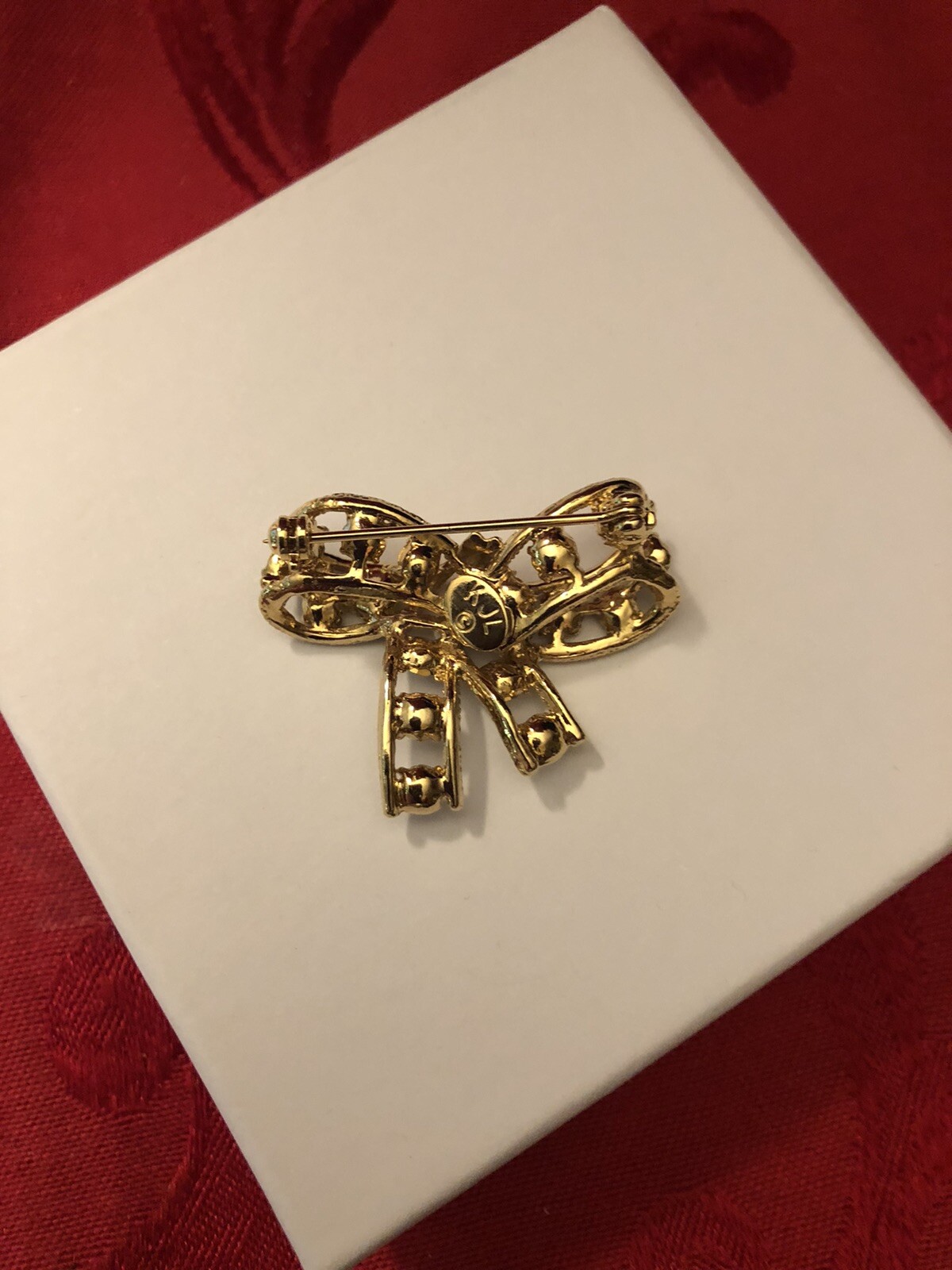 Kenneth Jay Lane KJL Signed Vintage Gold Tone Ribbon Brooch with Rhinestones