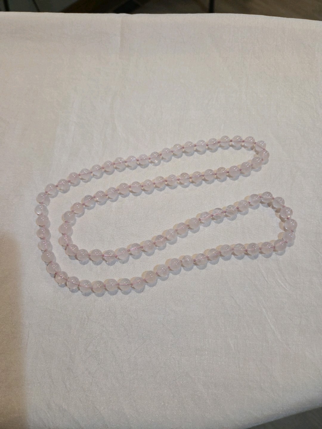 Delicate Vintage rose quartz necklace, continuous strand 31 inches in length.
