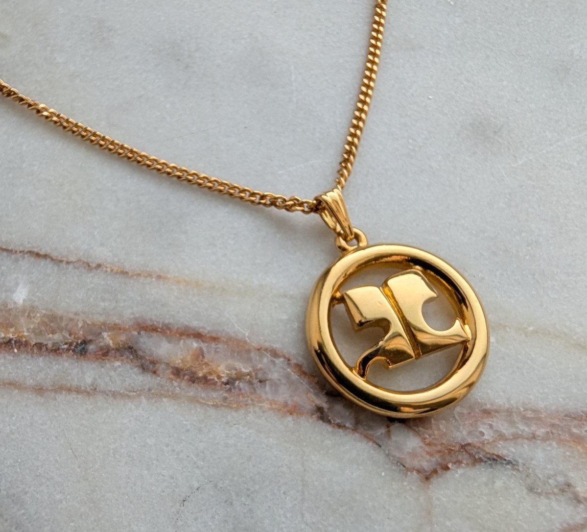 Vintage Courrèges Gold-Plated Circular “AC” Logo Pendant Necklace