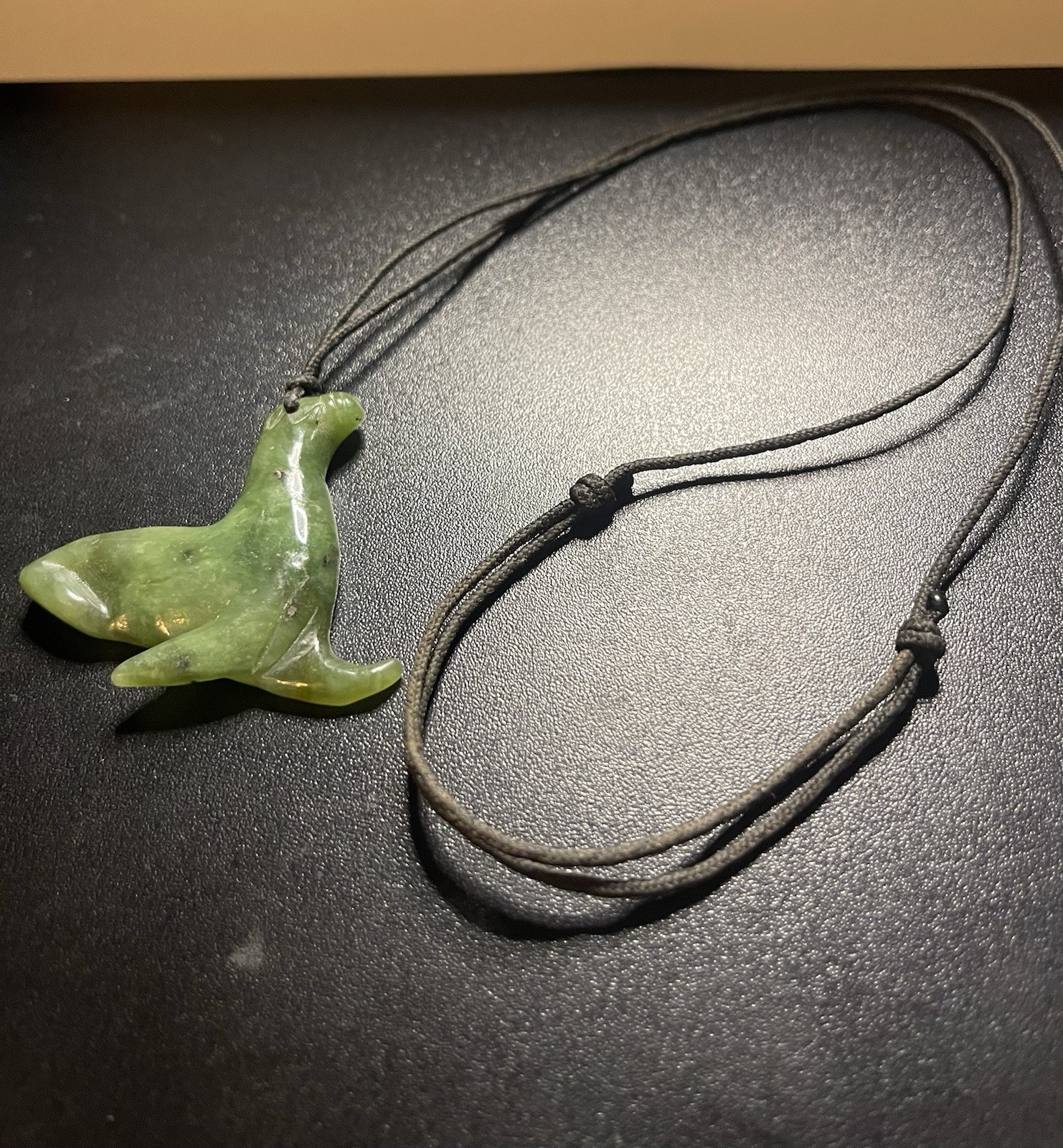 Jade Carved Pendant On A Black Chord