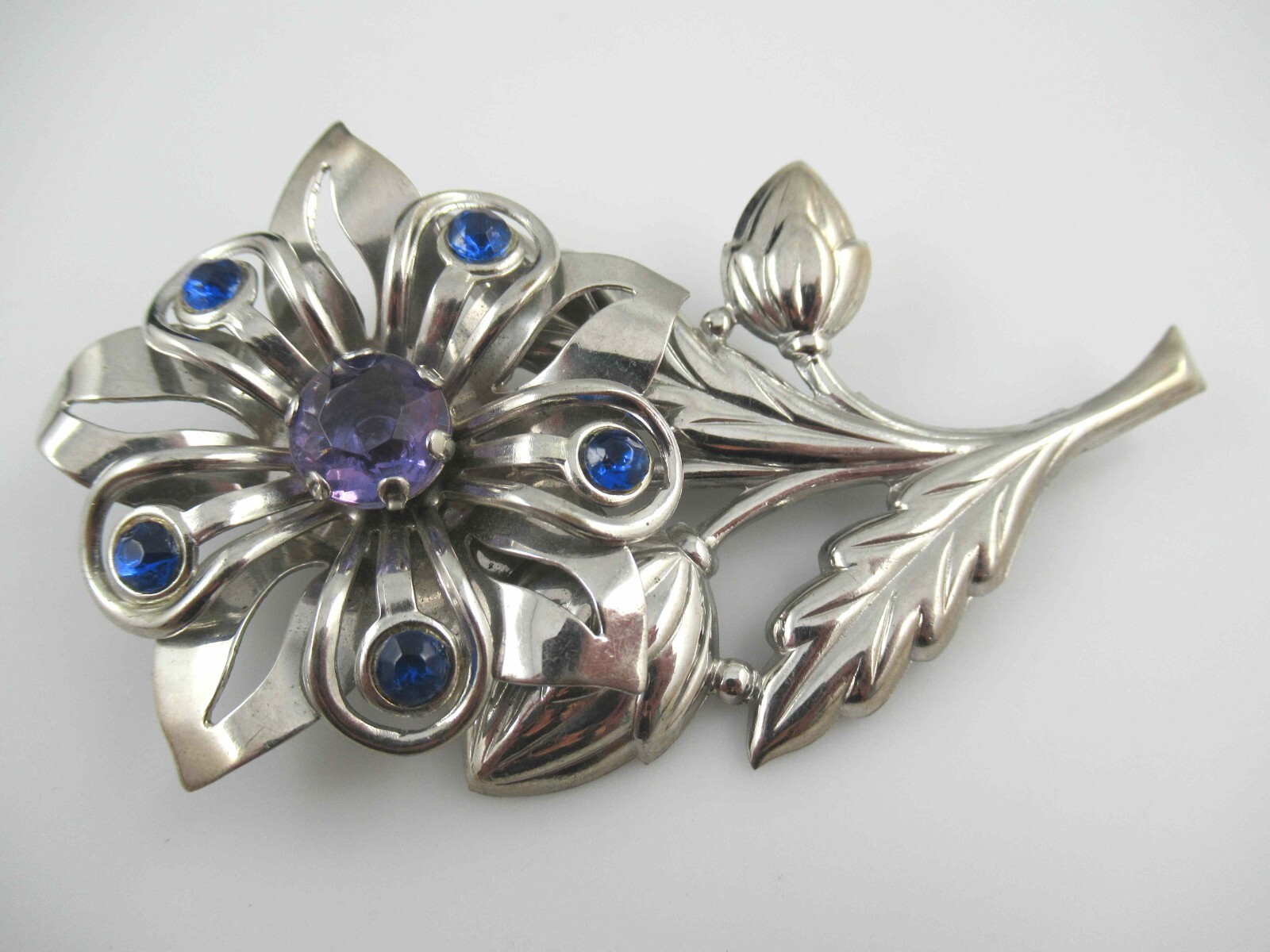Vintage Purple/Blue Rhinestone on Silver Tone Stamped Metal Flower Brooch, Pin