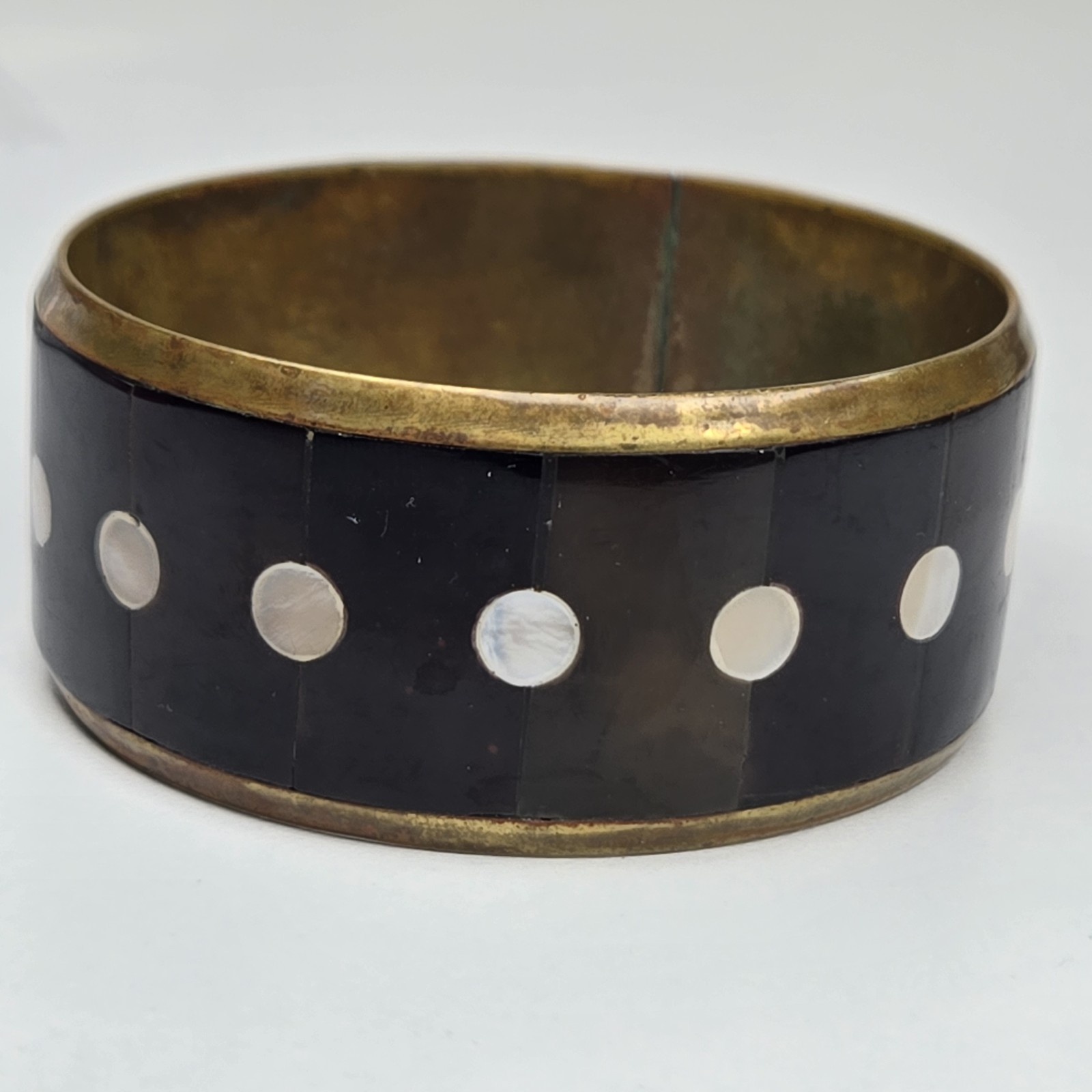Vintage 8 Inch Gold Tone Metal Black Stone And White Shell Inlay Bangle Bracelet