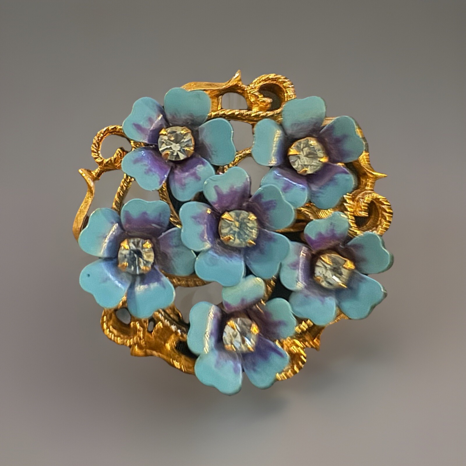 Avon Brooch Or Pendant With Blue And Purple Flowers With Rhinestones Gold Tone