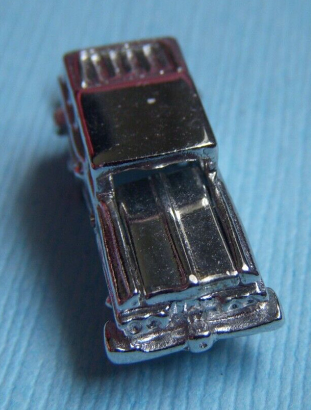 Vintage movable station wagon wheels move sterling charm